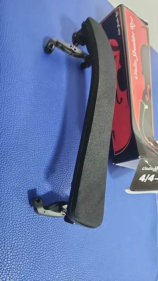 Black foam-cushioned shoulder rest photographed next to its printed box labelled 4/4-3/4, submitted by a verified buyer